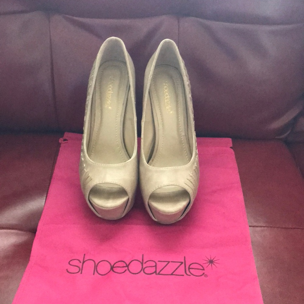 Nude leatherette heels.